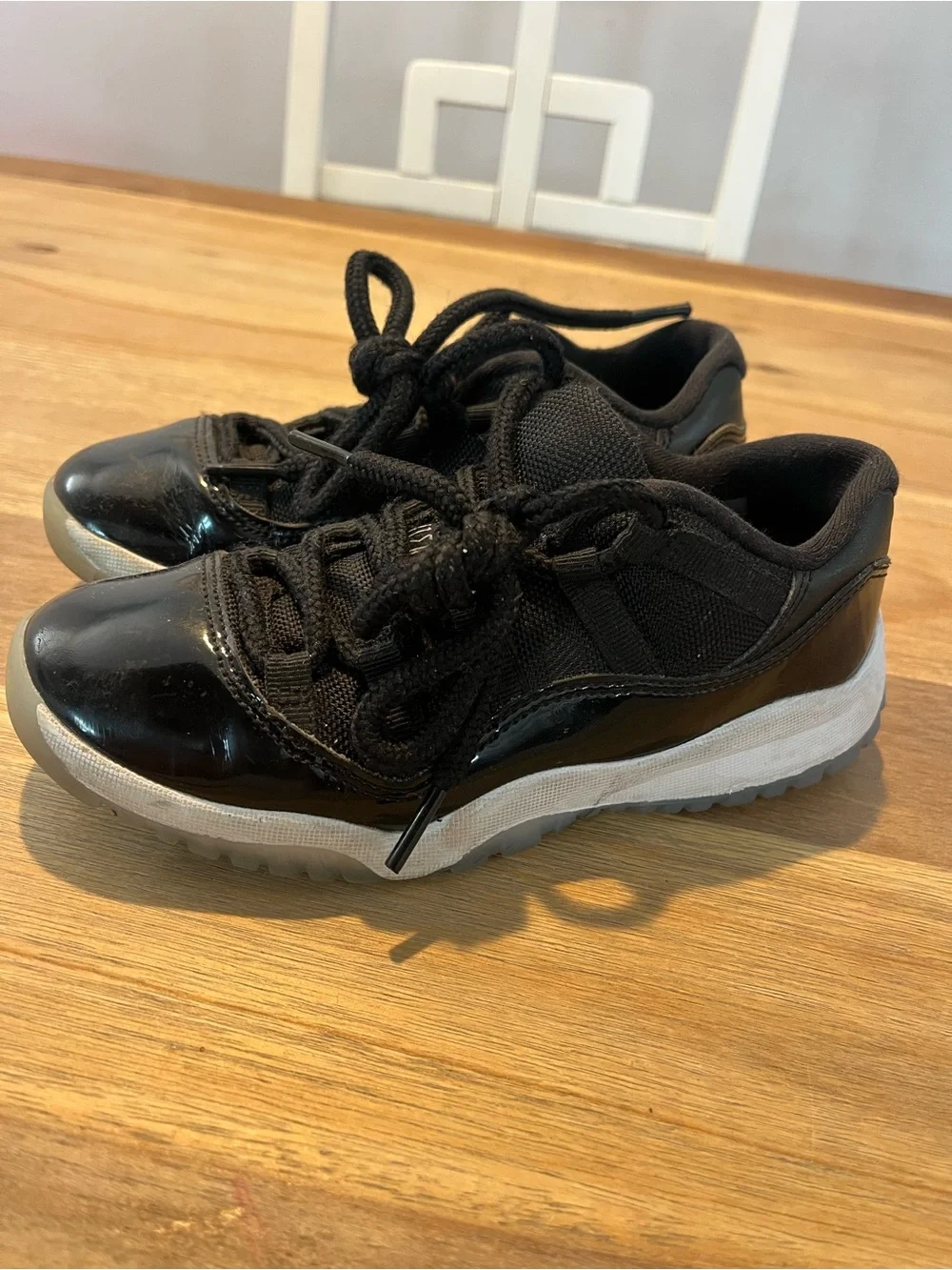 Jordan Black Low-Top Patent Leather Sneakers